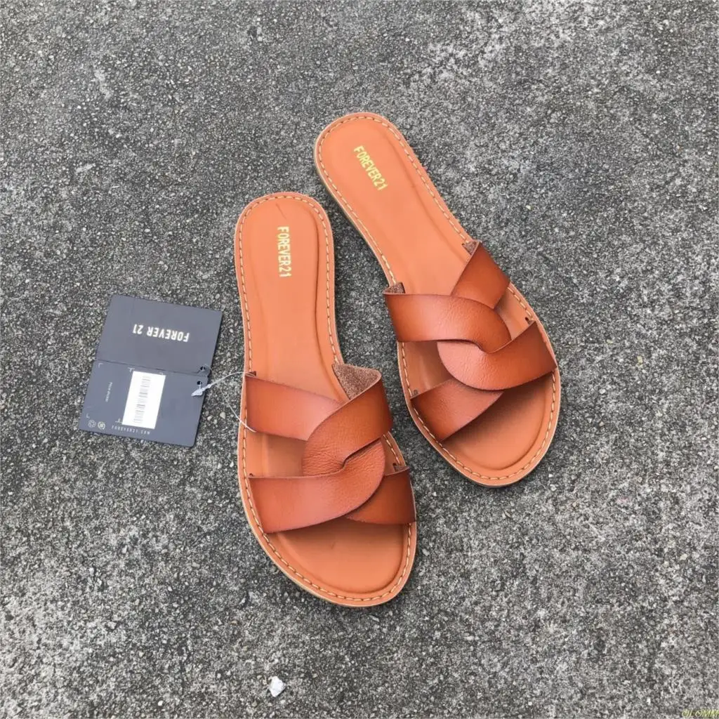 Factory direct new women's leather solid color two-layer leather flat bottom beach seaside holiday fashion slippers