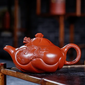 

Yixing red clay pot manual raw ore red robe fish dragon pot 250ml