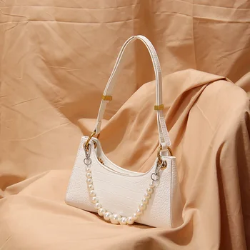 

Net red ins super fire purple armpit bag 2020 summer popular single shoulder portable pearl baguette bag female handbag purses