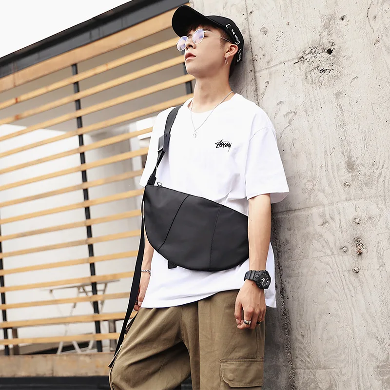 

Dumpling bag men's canvas fashion shoulder bag nylon messenger bag Korean student trend backpack