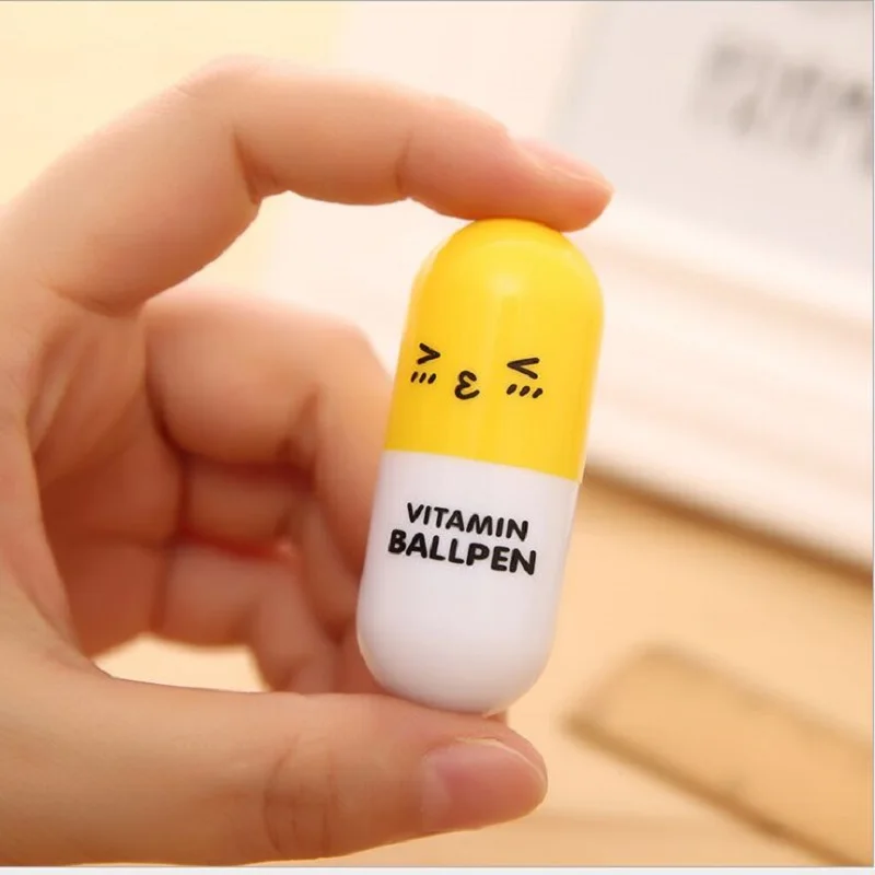wholesale Cute pill ballpoint pen Student stationery cartoon expression inflatable pen Capsule pen