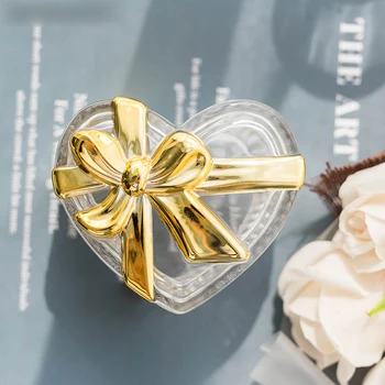 

Modern Glass Bow Jewelry Storage Box Simple Craft Clear Candy Storage Jar Desktop Organization Home Decoration Glass Jar and Lid