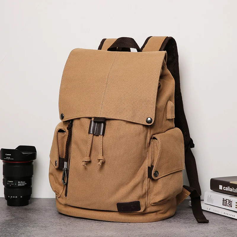 

The new backpack shoulder bag men's leisure high school student bag fashion canvas travel bag computer bag