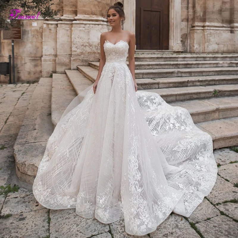 

Fsuzwel Gorgeous Appliques Lace Chapel Train A-Line Wedding Dresses 2020 Luxury Strapless Beaded Bridal Gowns Vestido de Noiva