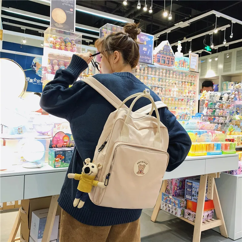 

2020 school bag female high school student backpack simple large-capacity tide portable backpack school bag backpack