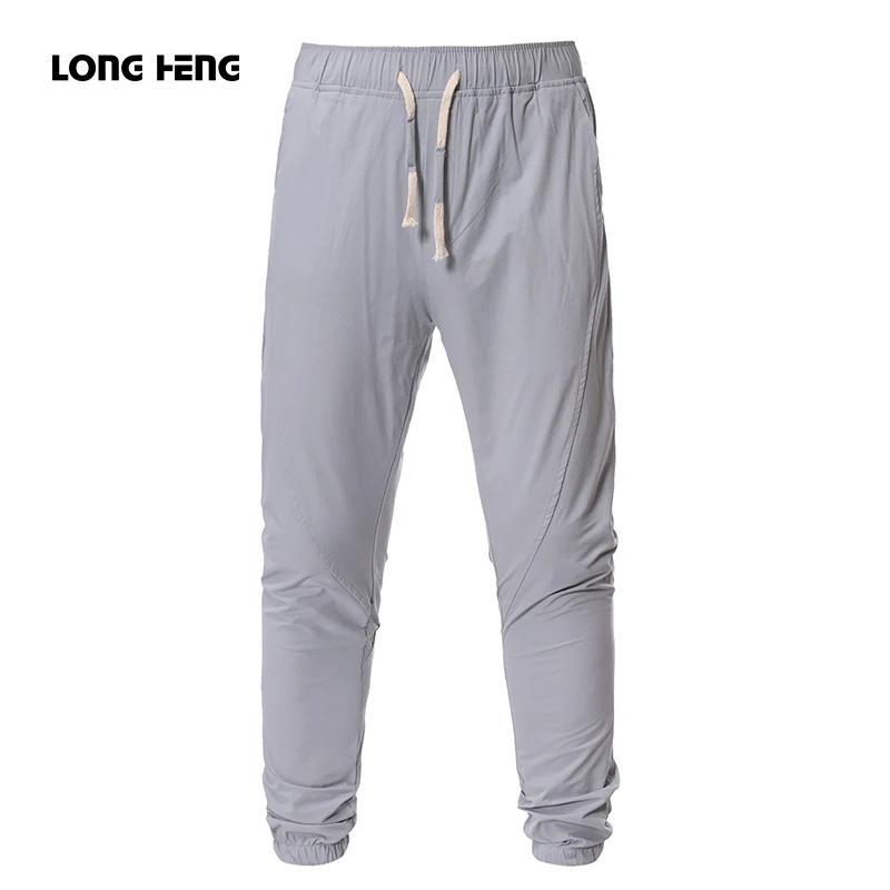 

LONGHENG Men Autumn Clothes Leisure Feet Trousers Big Size Sports Printing Super wei Pants Men's Wear Youth Elastic Force Pants