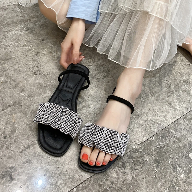 designer jelly flip flops