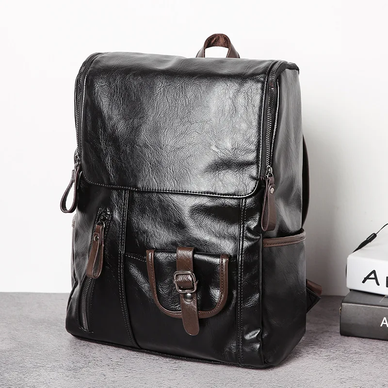 

New leisure double shoulder bag men backpack student schoolbag leather fashion sports travel computer bag