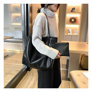 

Early autumn new big bag solid color literary shoulder bag travel large capacity simple soft leather wild portable lady bag