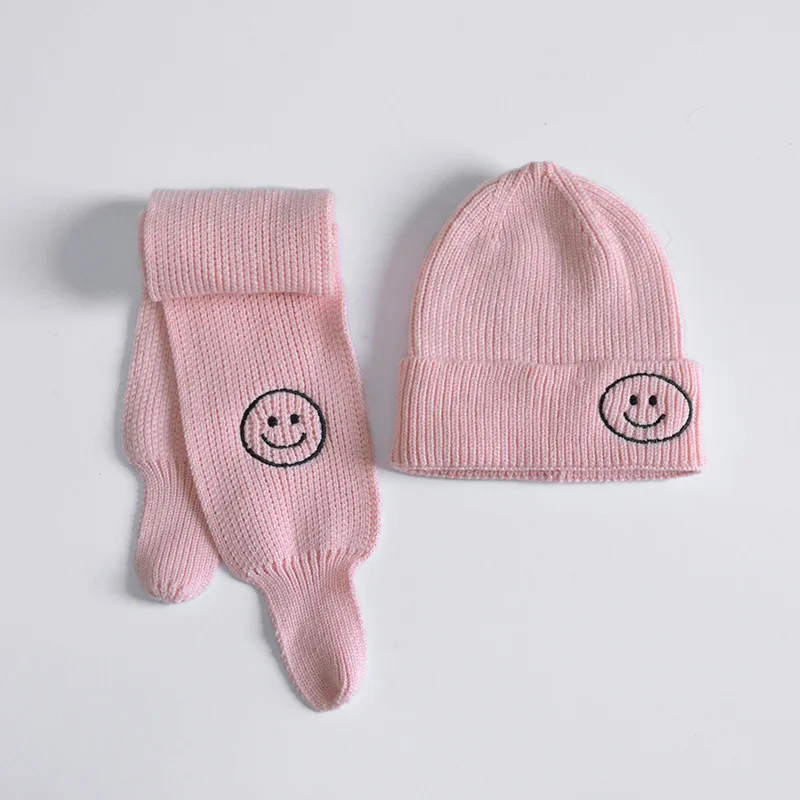girls pink hat and scarf