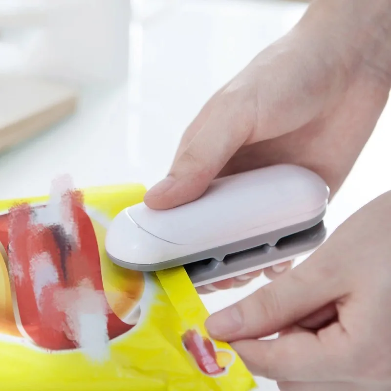 Snack sealing machine portable mini small plastic sealing machine household hand pressure plastic bag food preservation sealing