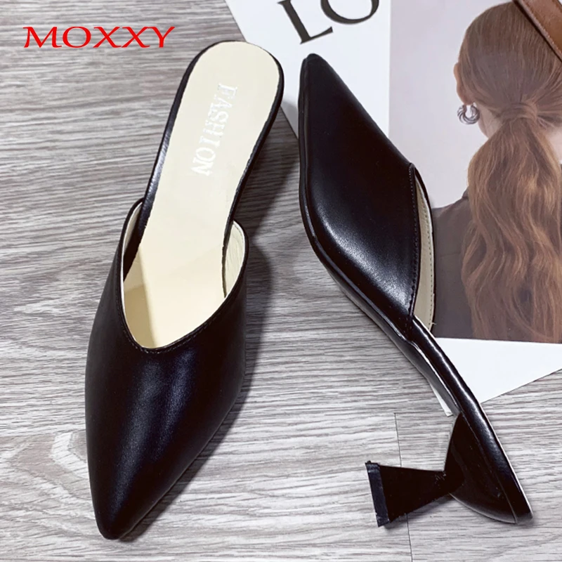 black and white mule shoes
