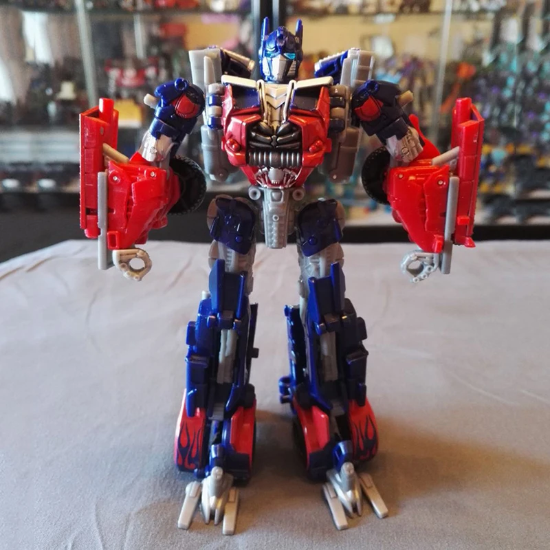 

Takara Tomy Deformation Robot PVC Metal Part Optimus S712 Autobots Robots Boy Birthday Gifts Transformers Toy