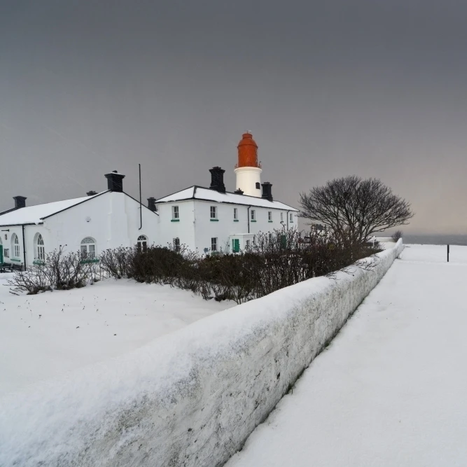 A Snow Covered Fence With Lighthouse And Building In The Background South Shields Tyne Wear England (19 x 12) | Дом и сад