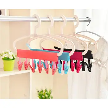 

4pcs Folding Fabric Hangers Racks Sticky Dots Sticky Traveling Clothespin Fasten Hanging Clips Tie Racks (Assorted Color)