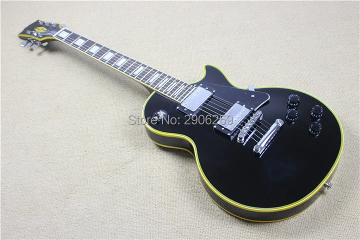 

Factory direct ,hot sale black custom 1960s electric guitar,yellow binding,free shipping