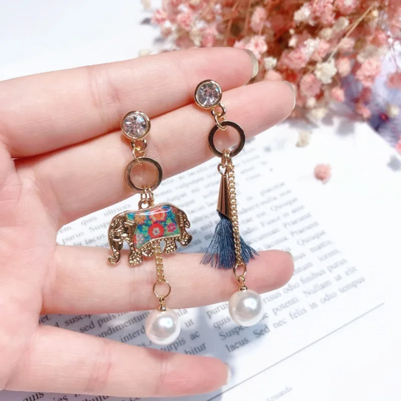 

New Bohemian Personality Asymmetrical Pearl Elephant Fringe Earrings Female Temperament Wild Pearl Crystal Long Earrings