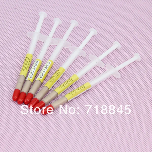 100 pcs الكثير الذهب الحقنة بقيادة IC VGA وحدة المعالجة المركزية XBOX360 Heaksink المركبات معجون حراري