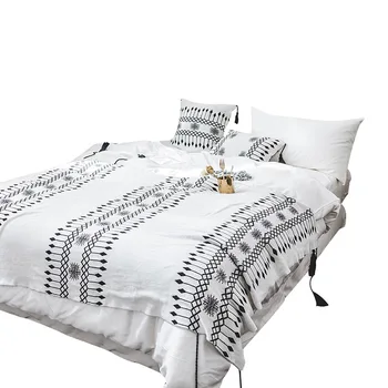 

Nordic Black And White Blanket with Tassels European 100% Cotton Geometric Knitted Luxury Throw Blanket for Adults