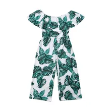 green palm print jumpsuit