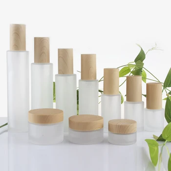 

New style 30g frosted round empty glass cream jars for sale, 1 oz Glass Face Cream Jar with Wood grain cover wholesale