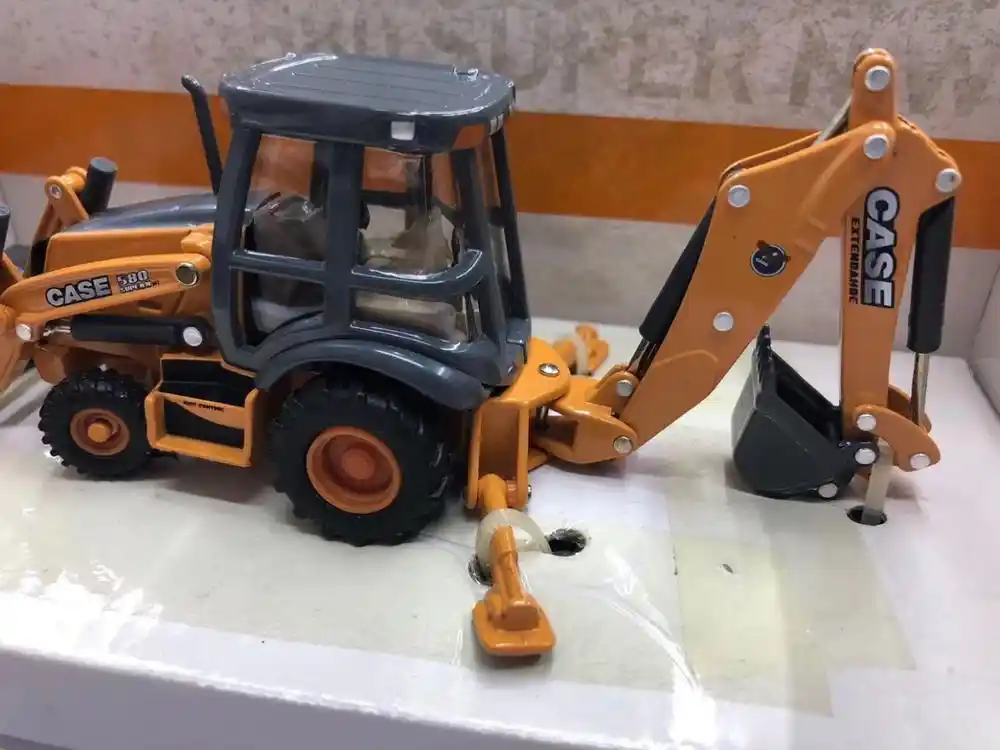 diecast case backhoe