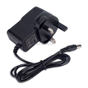 

50PCS High Quality AC100V-240V Converter DC 9V 1A 1000mA UK Plug Power Adapter Supply Tablet Charger Reverse Polarity Negative
