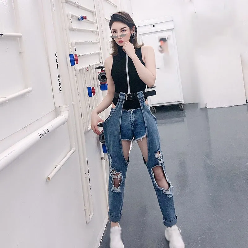 Moda coreana primavera 2019 nuevo Sexy mujer Hole Jeans Irregular Hollow Out Pants Fake 2 uds Hip Hop cinturón de alta cintura Jeans -
