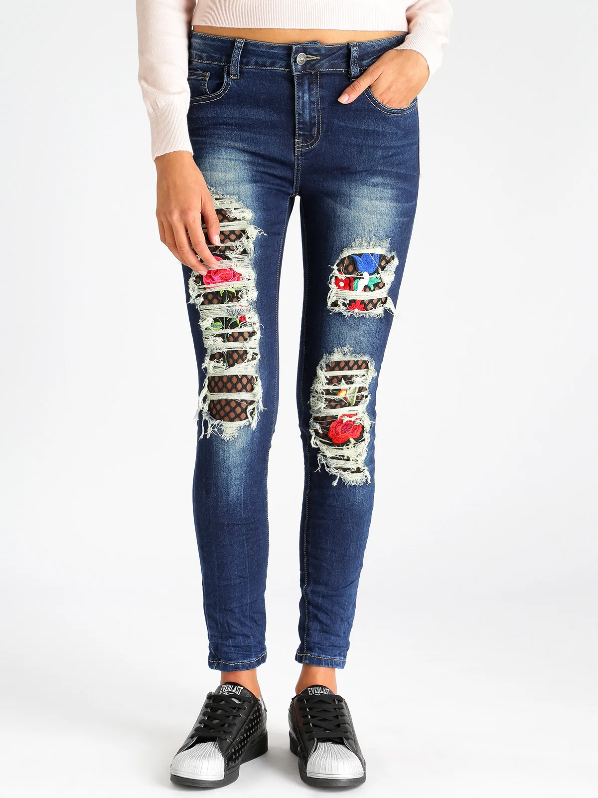 Ripped jeans with embroidery patches fiorate fishnetin jeans from Ripped jeans with embroidery patches fiorate fishnetin jeans from