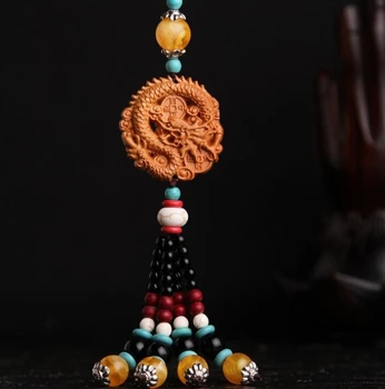 

Chinese Peach Wood Carving Double Faced Dragon Money Coin Safe And Good Luck Exquisite Car Key Pendant Bag Pendant