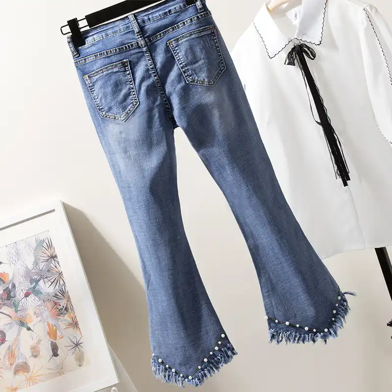 jeans with pearls on the bottom
