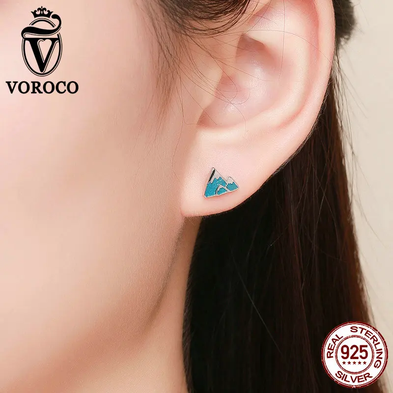 Серьги гвоздики VOROCO из серебра 925 пробы с голубым айсбергом серьги треугольной
