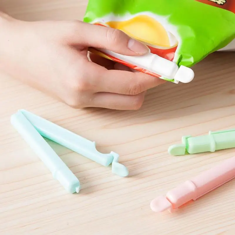 

4 Pcs Food Snack Storage Sealing Seal Bag Clips Sealer Clamp Food Bag Clips Kitchen Tool Home Food Close Clip Seal