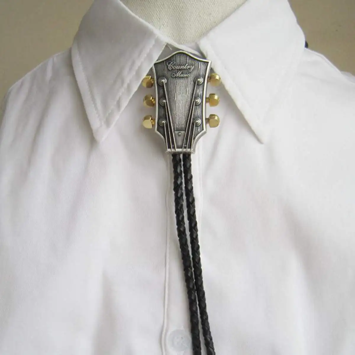 

Men Fashion Bolo Tie Cowboy Male Accessories Black PU Leather Bolo Tie With "country music" Guitar Metal Buckle Custom Chain Tie