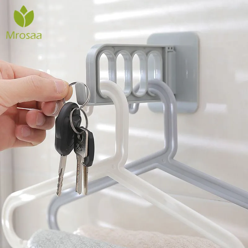 1 Pcs Mrosaa Four-hole Hanger Hooks Household Wall-mounted Punch-free Seamless Storage Rack Paste-type Magic Coat Hook Holder |