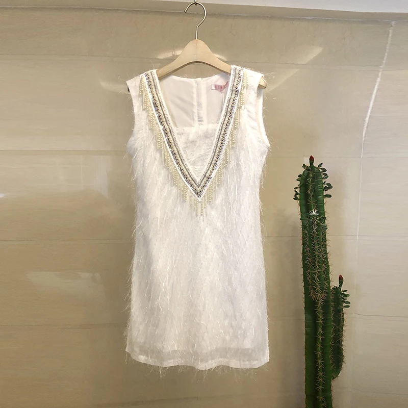 

2019 New Summer Fashion Dress Women Luxury White Tassel Beading Pearl Sleeveless Party Dress Vintage V Neck Fringe Vestidos