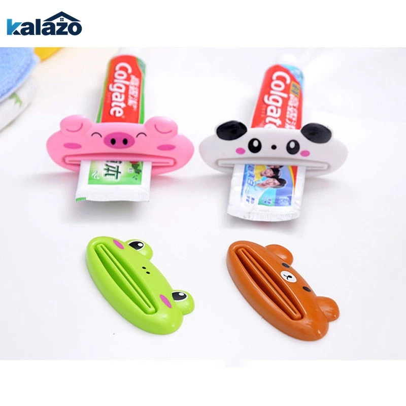 

HOT Bathroom Home Tube Rolling Holder Squeezer Easy Cartoon Toothpaste Dispenser 2018