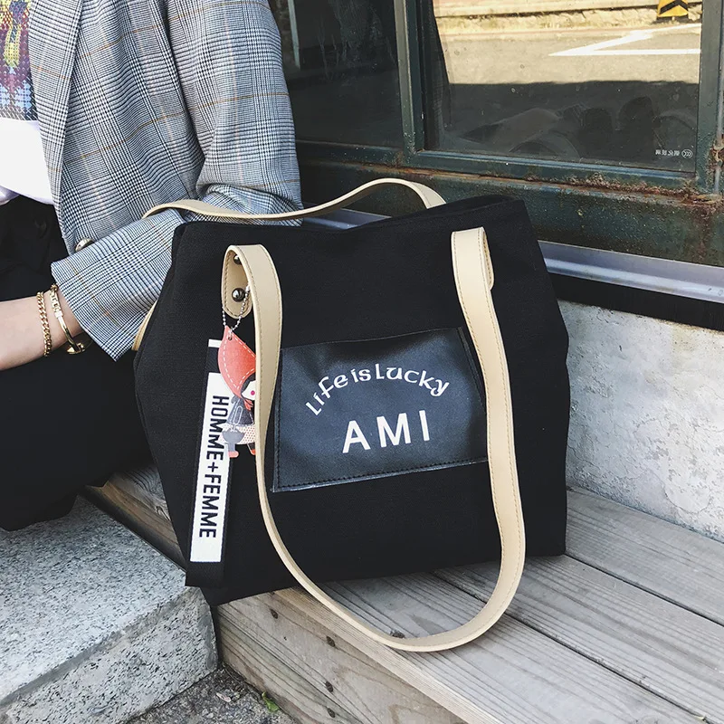 

2019 New Ladies Hand Bags College Wind Travel Portable Canvas Women Beach Bag Shoulder Bag Solid Color Letters Large Capacity