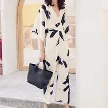 New Arrival Summer Women V-Neck Slim Jumpsuits Female Floral Print Three Quarter Sleeve Wide-Leg Rompers New Arrival Summer Women V-Neck Slim Jumpsuits Female Floral Print Three Quarter Sleeve Wide-Leg Rompers
