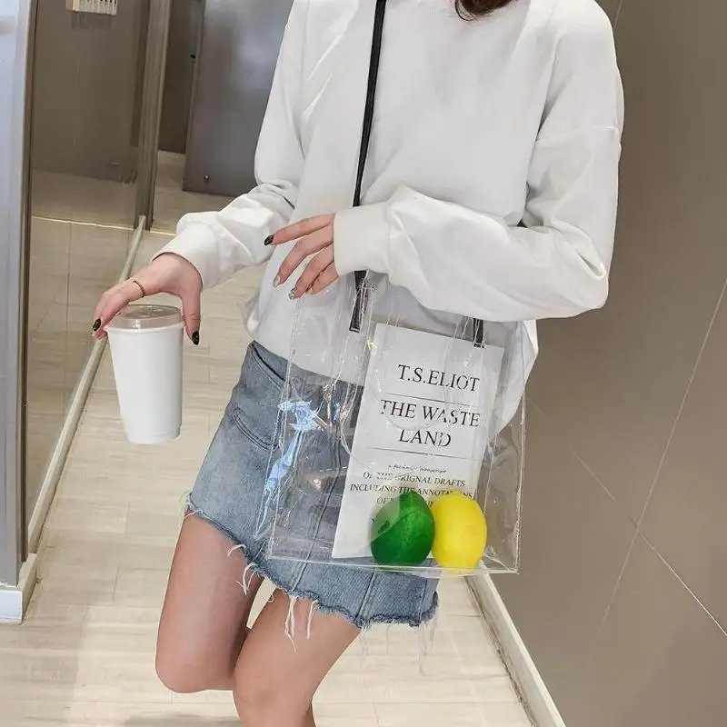 حار بيع الهولوغرام شفافة البلاستيك يد شاطئ حقيبة كتف المرأة الاتجاه حمل هلام الأزياء PVC كيس تغليف الفاكهة حار بيع الهولوغرام شفافة البلاستيك يد شاطئ حقيبة كتف المرأة الاتجاه حمل هلام الأزياء PVC كيس تغليف الفاكهة