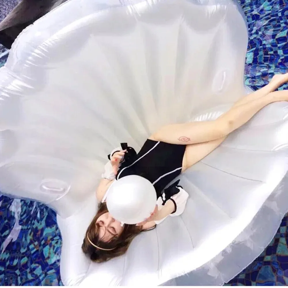 

Yiwu Aquatic Articles Sandy Beach Environmental Protection Pvc Pearl Shell Floating Bed Aquatic Sports Inflation Float Row
