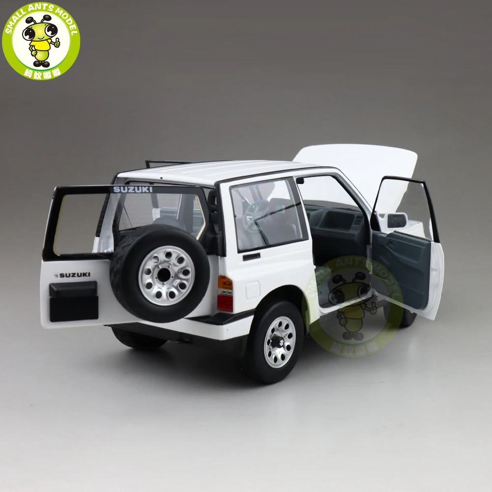 1/18 DORLOP Suzuki Vitara Escudo с левым приводом Модель автомобиля игрушки детские подарки для мальчиков девочек белого цвета