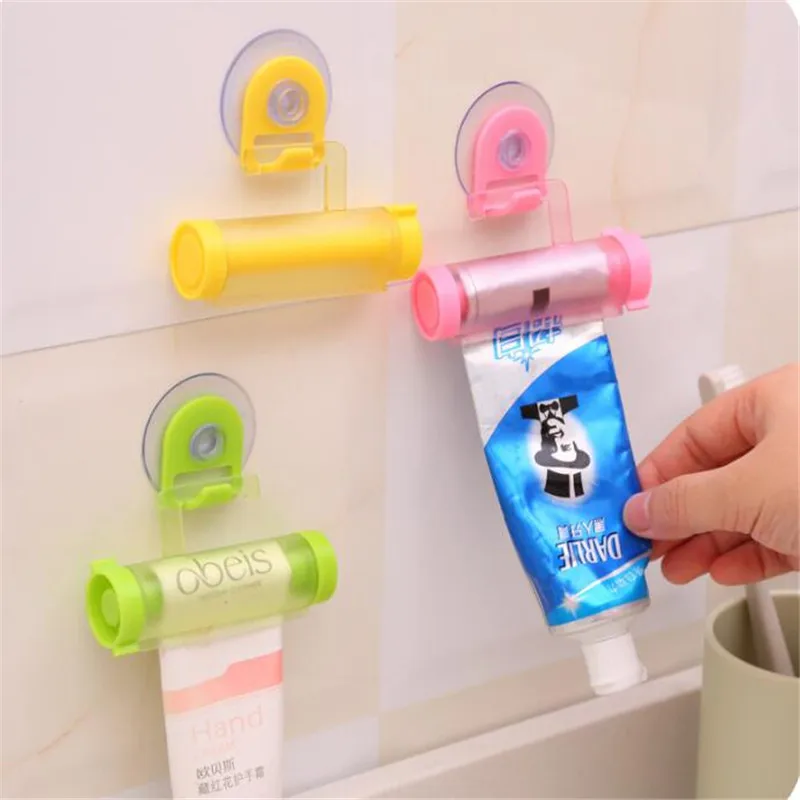 New 1 PCS Creative Rolling Squeezer Toothpaste Dispenser Tube Partner Sucker Hanging Holder