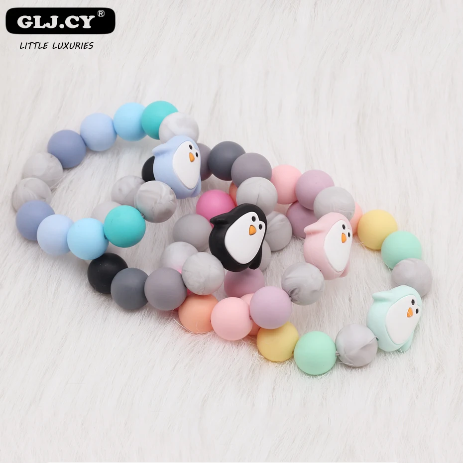 

2019 New Baby Bracelet Small Penguin Styling Jewelry Baby Molar Organic Wood Silicone Beads Baby Rattle Cart Accessories Toys