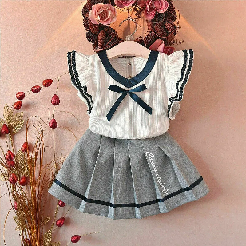 

Preppy Kids Baby Girls Summer Sets Ruffle Fly Sleeve Bow V-Neck Tops T-shirt+Pleated Skirts 2Pcs Outfits Girl Clothes 2-7Y