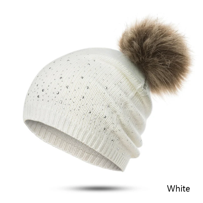 white beanie hat with pom pom
