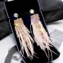 FYUAN-pendientes de lujo de cristal brillante para mujer, aretes largos con borla, pendiente con diamante de imitación pluma rosa, joyería para fiesta y boda