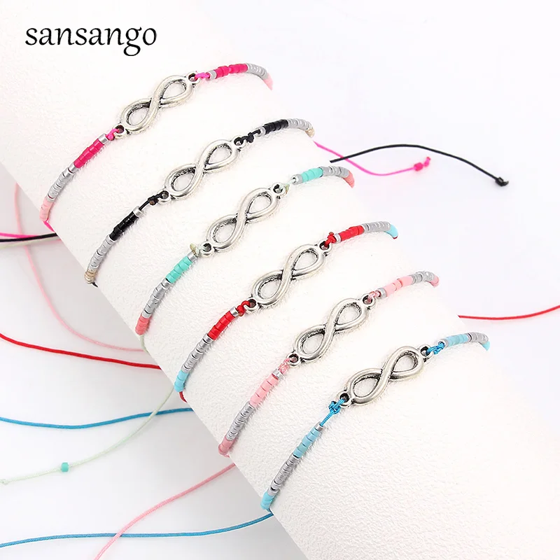 

12 Pcs Pink Blue Rope Handmade Bracelets With Infinity Sign Shape Alloy Pendant Charm For Women Girls Adjustable Bangle Birthday