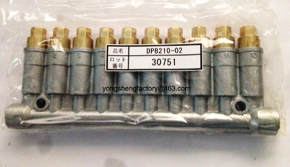 Showa detective volumetric oil distributor lubricant doser valve lubrication manifold divider 0