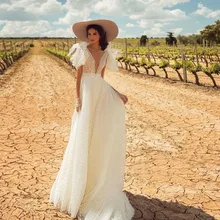 Vivian's Свадебная мода негабаритных лук пятно Аппликации Бохо свадебное платье сексуальный глубокий v-образным вырезом спинки Часовня Поезд свадебное платье